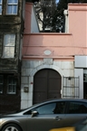 From the main street: the entrance of the ecclesiastical complex with the marble frame