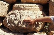 Dara, Upper Mesopotapia. Our Kurd ‘guide’ caresses the ‘beautifully carved stone’ (an early byzantine capital) which decorates the river bed of his village