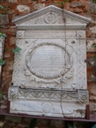 Στο προάυλιο της Παναγίας Καφφατιανής: Ταφόπλακα από το μνήμα του Ιωάννη Χ. Γεωργίου (γενικό)
